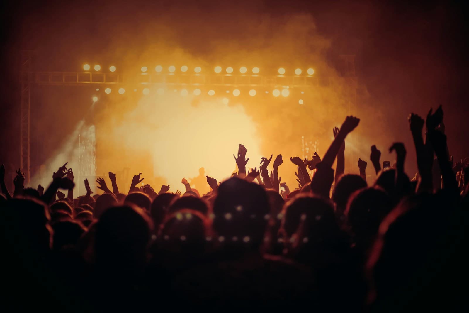 Crowd gathered in front of the stage at an intimate electronic music event